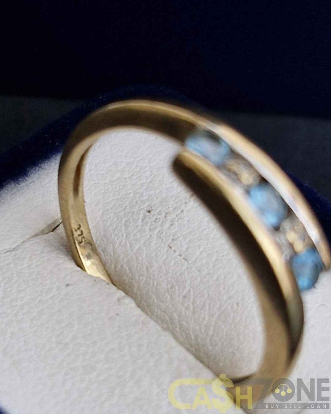 Ladies 9ct Yellow Gold Blue Stone Bypass Ring