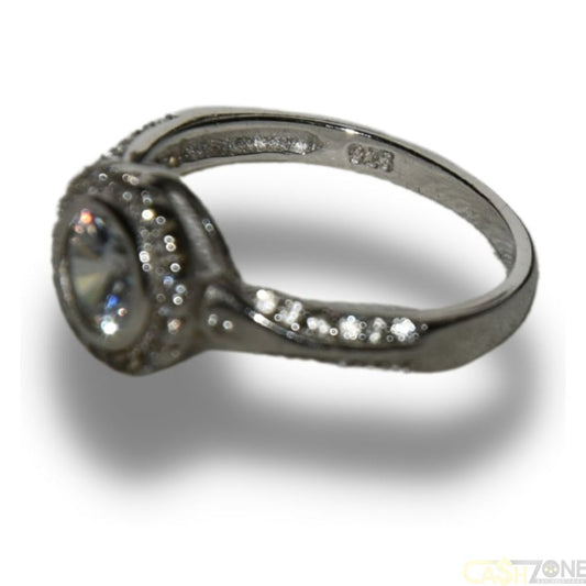 LADIES SILVER RING WITH 1 CLEAR STONE AND SURROUNDED WITH 21 SMALL STONES SIZE- M