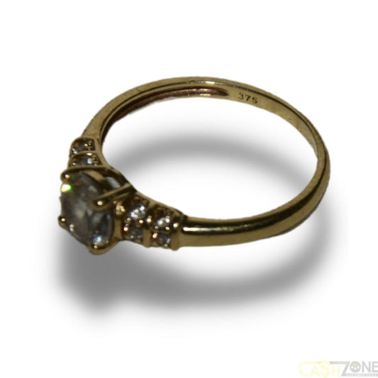 LADIES 9CT YELLOW GOLD SOLITAIRE STYLE RING WITH CLEAR STONES