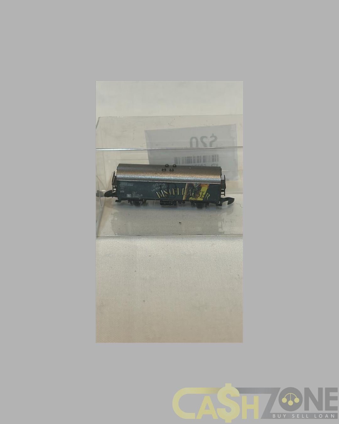 MODEL TRAIN IN PLASTIC DISPLAY BOX SILVER AND YELLOW