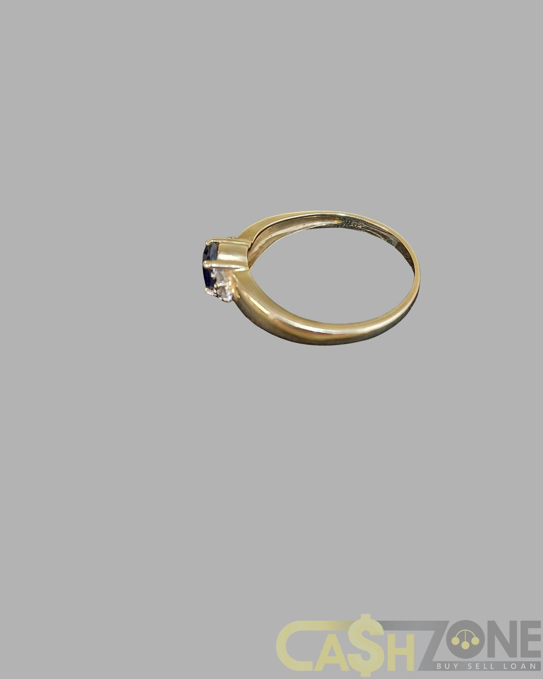 Ladies 9ct Yellow Gold Ring With Blue Stone and Clear Stones