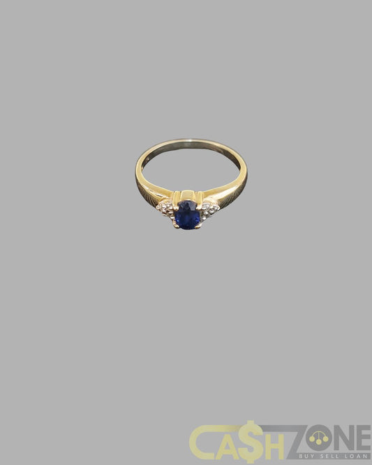 Ladies 9ct Yellow Gold Ring With Blue Stone and Clear Stones