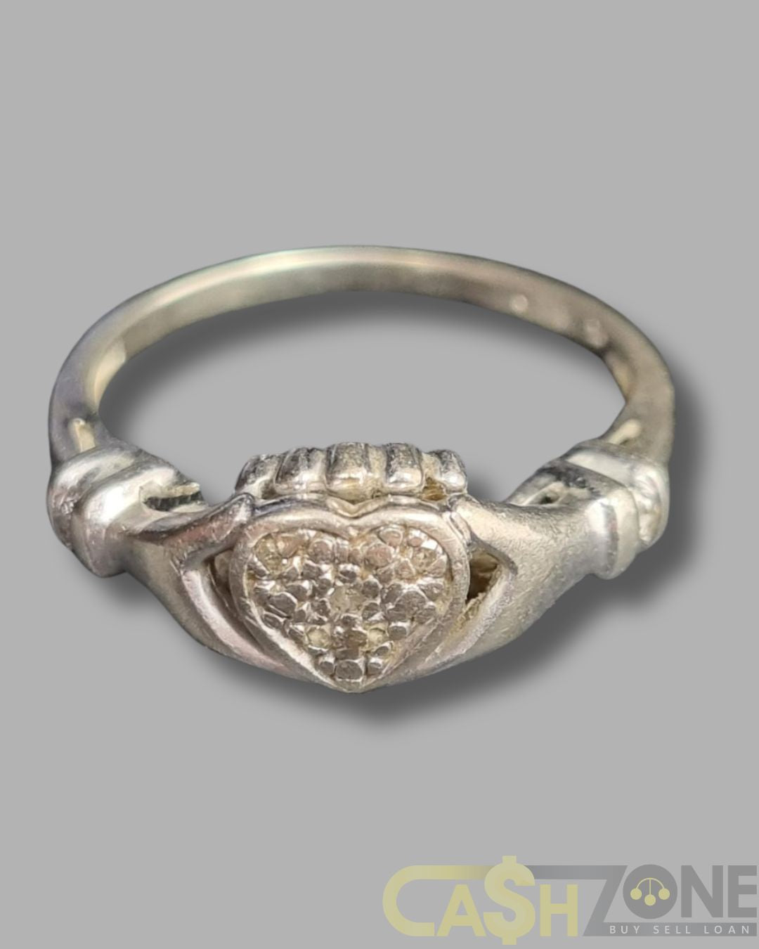 Ladies 9ct White Gold Claddagh Ring With Small Clear Stones