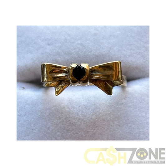 9CT Yellow Gold Ladies Bow Ring W/ Blue Stone