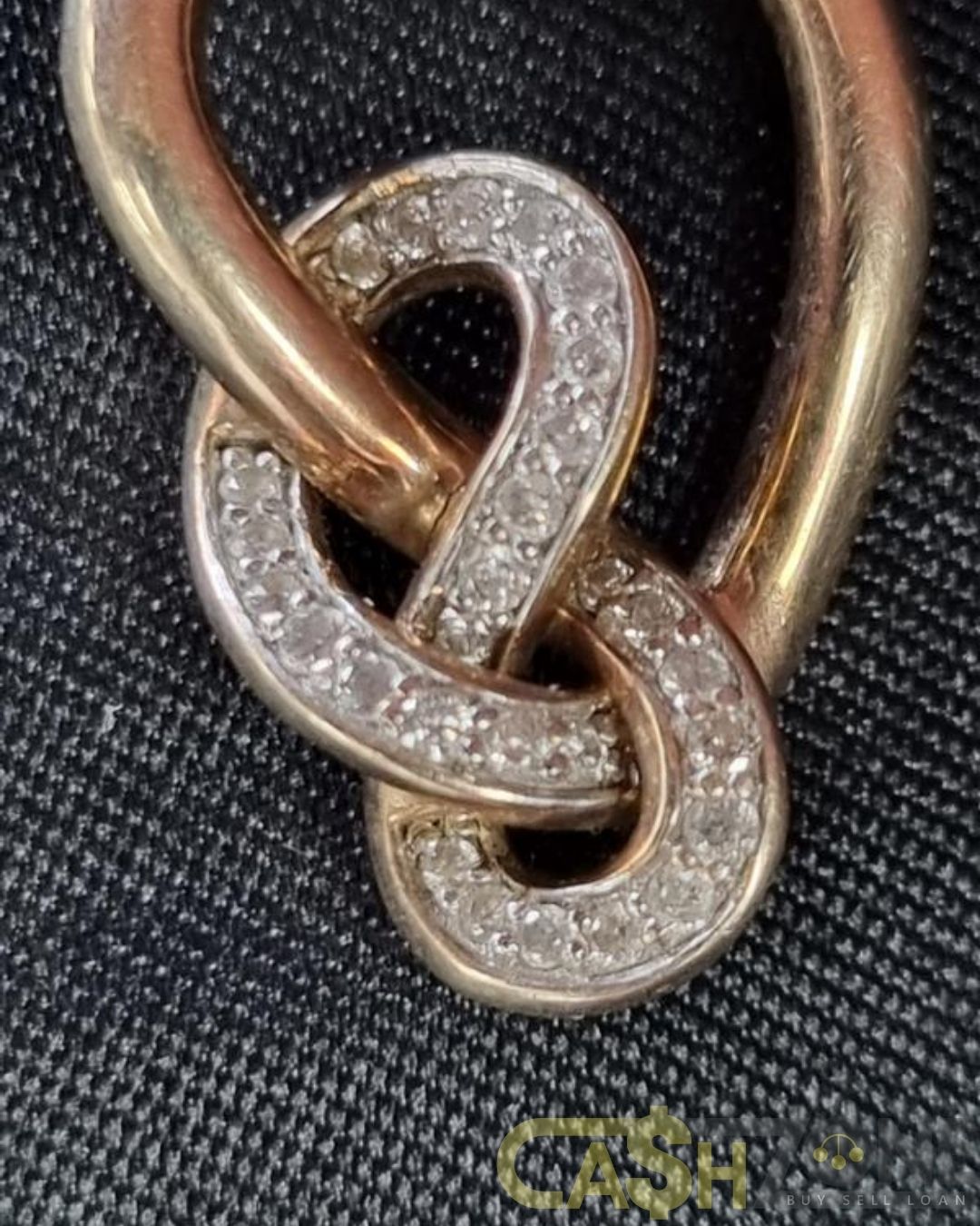 Ladies 10ct Yellow Gold Clear Stone Knot Pendant