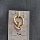 Ladies 10ct Yellow Gold Clear Stone Knot Pendant