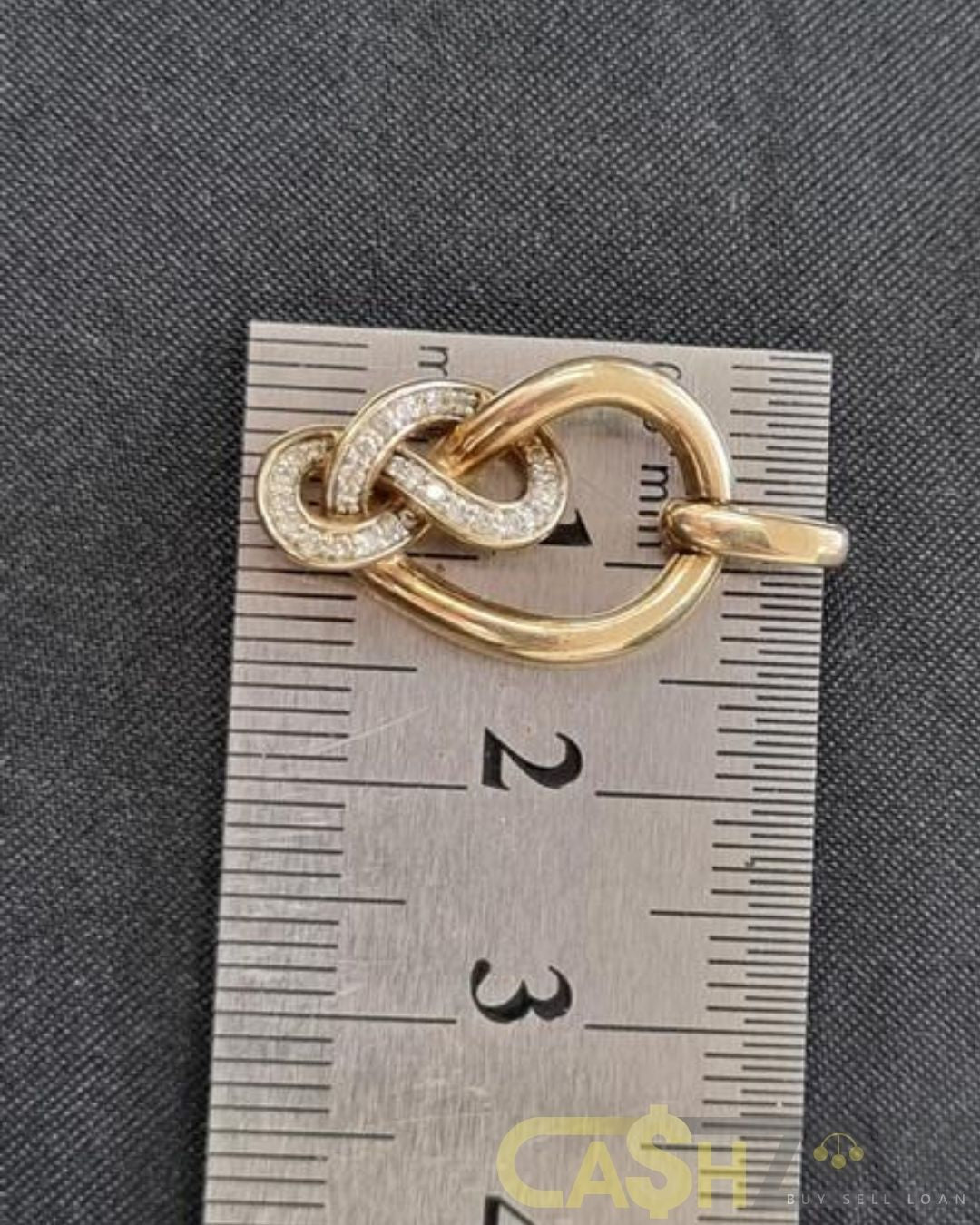 Ladies 10ct Yellow Gold Clear Stone Knot Pendant