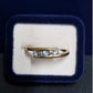 Ladies 9ct Yellow Gold Blue Stone Bypass Ring