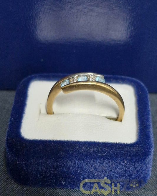 Ladies 9ct Yellow Gold Blue Stone Bypass Ring