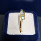 Ladies 9ct Yellow Gold Blue Stone Bypass Ring