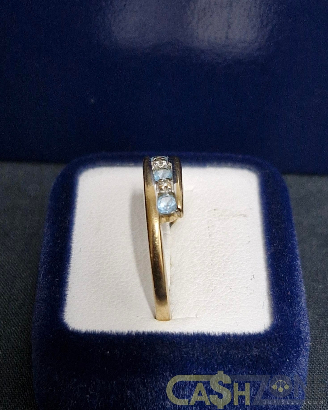Ladies 9ct Yellow Gold Blue Stone Bypass Ring
