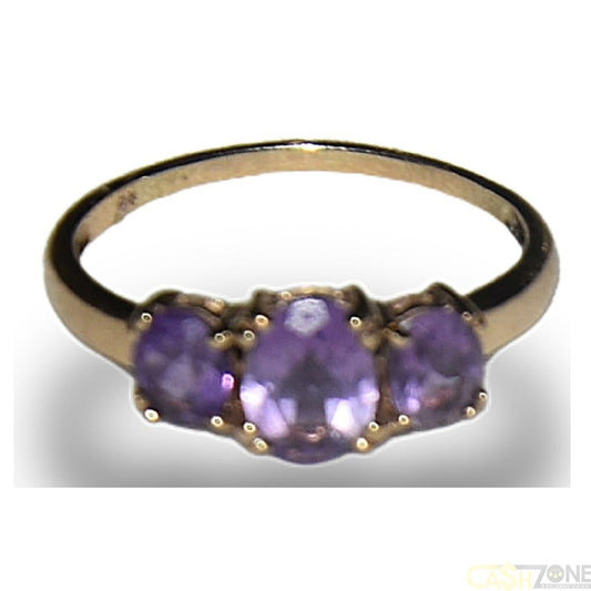 LADIES 9CT YELLOW GOLD RING w PURPLE STONES